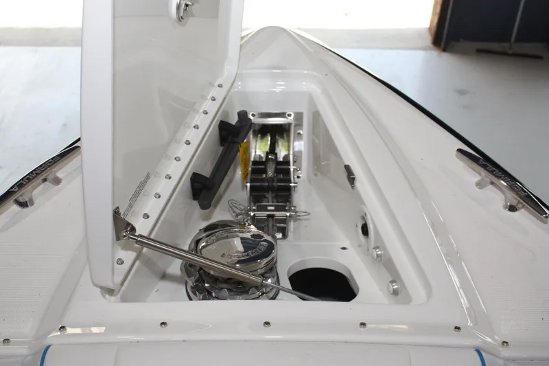 Slide: The Image of 2027 Formula 330 Crossover Bowrider I/O anchor compartment detail. - 45