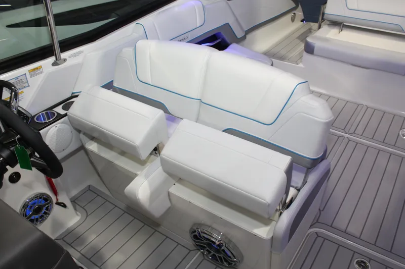 Slide: The Image of 2027 Formula 330 Crossover Bowrider I/O interior with white seating and modern design. - 56