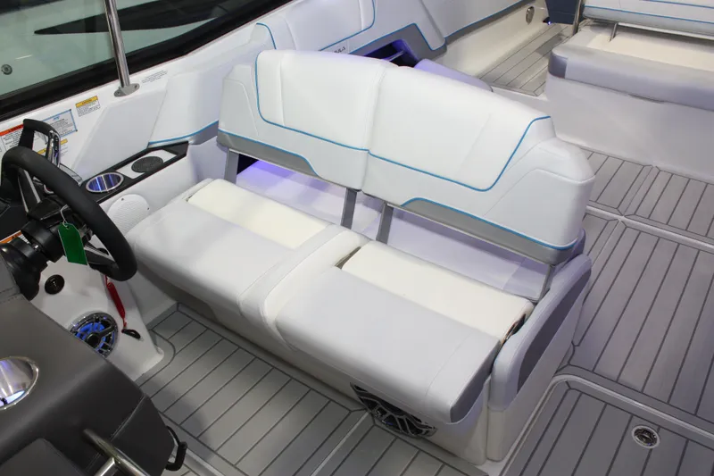 Slide: The Image of 2027 Formula 330 Crossover Bowrider I/O interior with white seating and modern dashboard. - 57