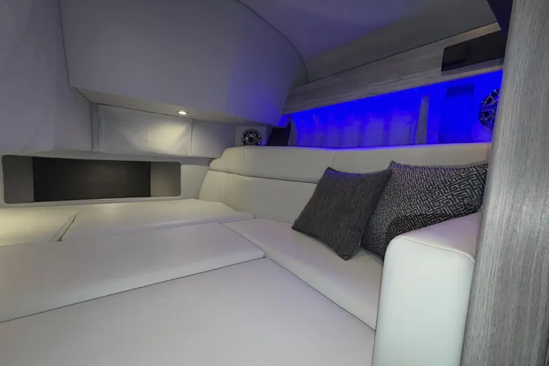 Slide: The Image of Luxurious interior of 2027 Formula 330 Crossover Bowrider I/O with modern seating and ambient lighting. - 38