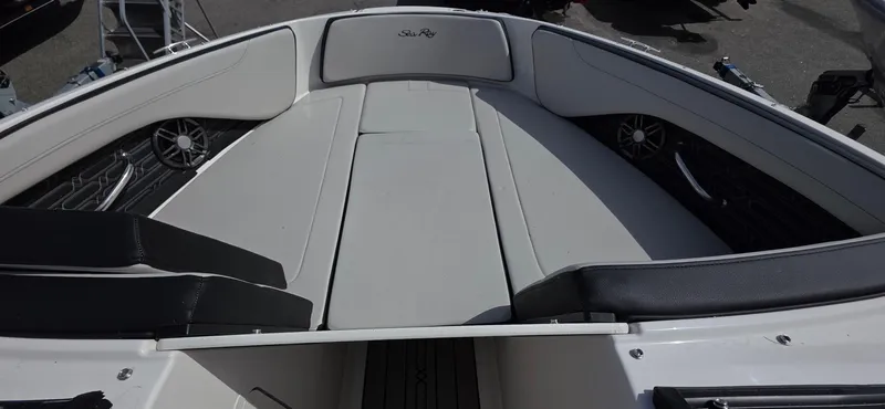 Slide: The Image of 2025 Sea Ray SPX 190 boat interior with sleek seating and modern design. - 10