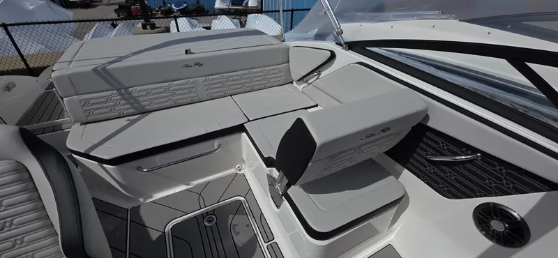 Slide: The Image of 2025 Sea Ray SPX 190 boat interior with sleek seating and modern design. - 11