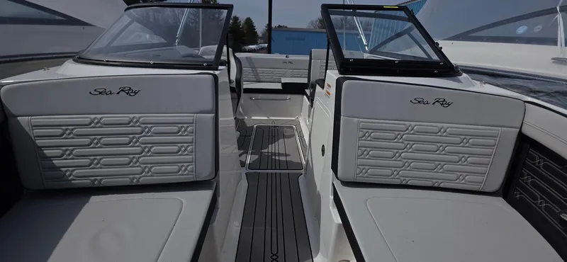 Slide: The Image of 2025 Sea Ray SPX 190 boat interior with stylish seating and modern design. - 15