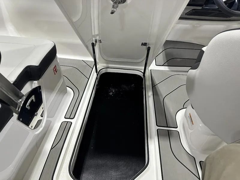Slide: The Image of Interior storage compartment of 2025 Sea Ray SPX 190 OB boat. - 16