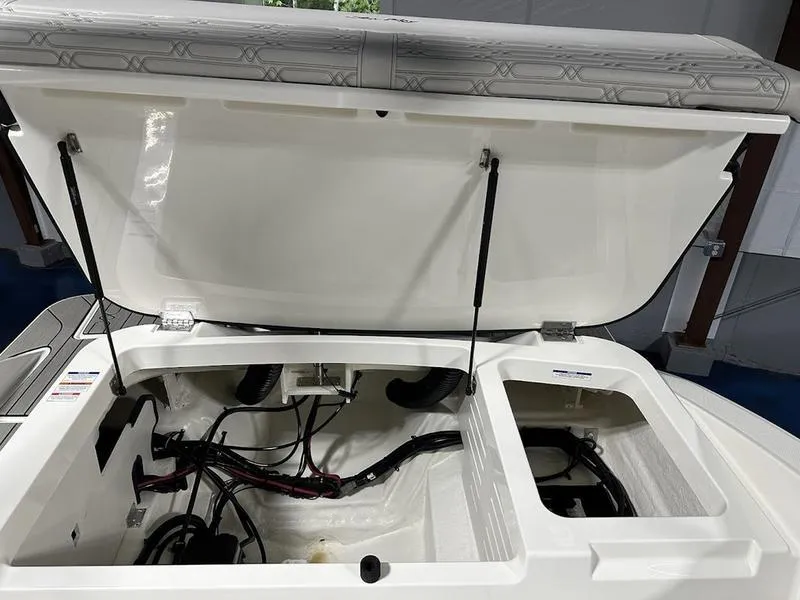Slide: The Image of Open engine compartment of 2025 Sea Ray SPX 210 OB boat. - 13