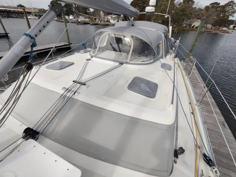 Slide: The Image of Sailboat docked at marina, Stevens Custom 53/56, 2005 model, with visible deck and rigging. - 14