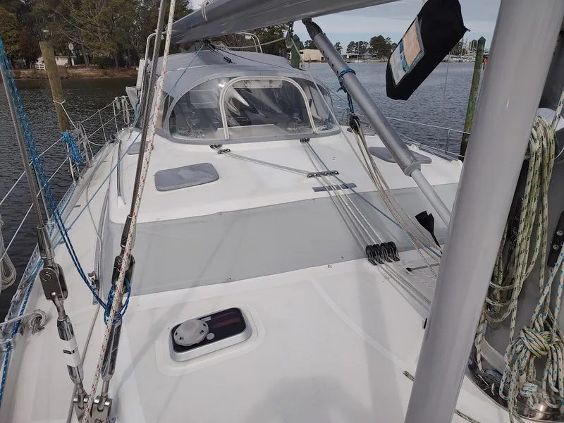 Slide: The Image of Sailboat deck of 2005 Stevens Custom 53/56, featuring rigging and cockpit enclosure. - 18