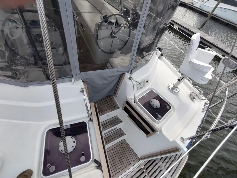 Slide: The Image of Stevens Custom 53/56 yacht deck, 2005 model, featuring helm and seating area. - 25