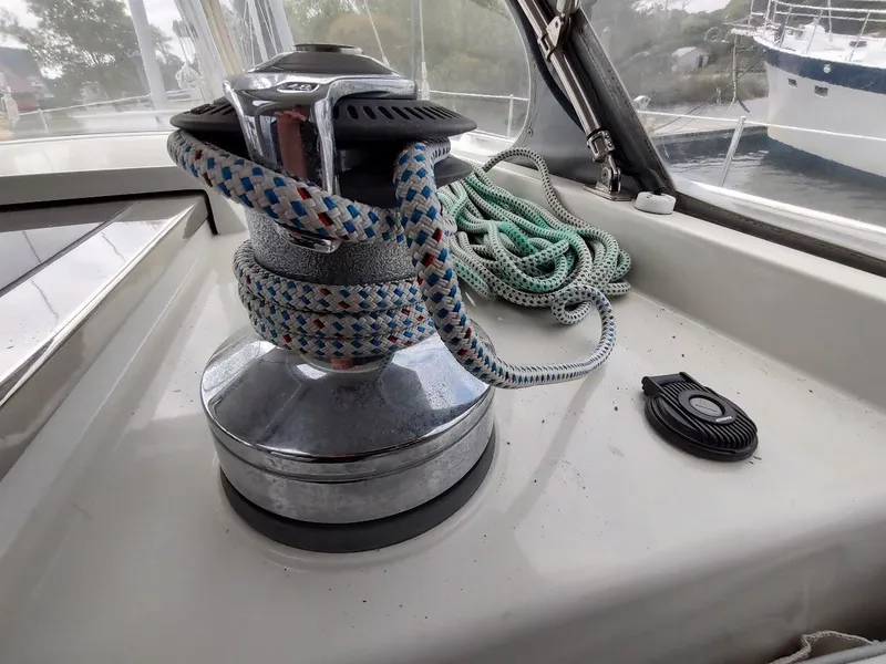 Slide: The Image of Sailboat winch with ropes on a 2005 Stevens Custom 53/56 yacht deck. - 36