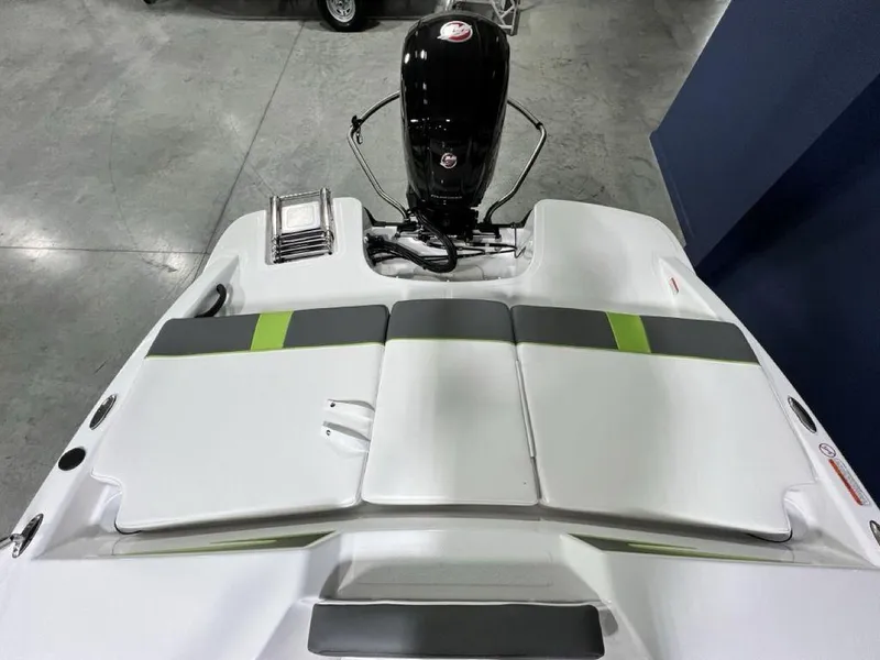 Slide: The Image of 2024 Tahoe T18 boat with outboard motor, rear seating, and modern design. - 17