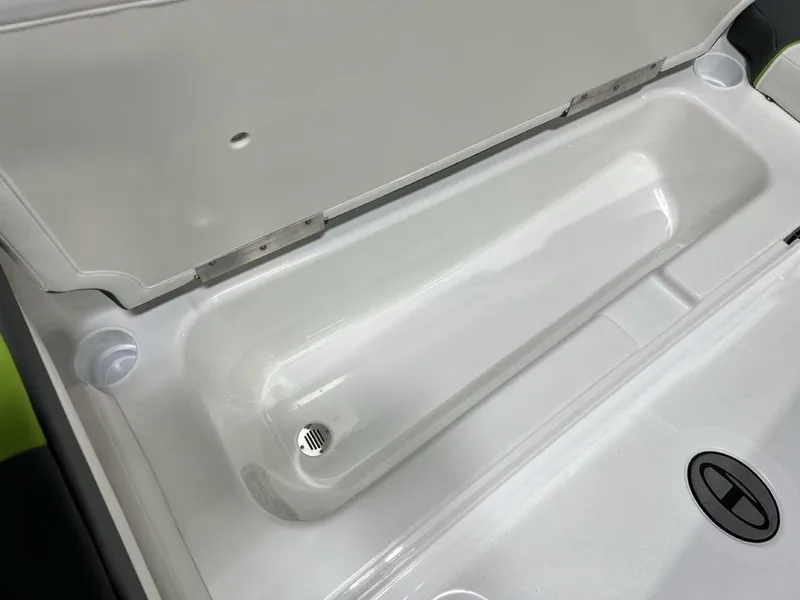 Slide: The Image of 2024 Tahoe T18 boat storage compartment with open lid. - 5