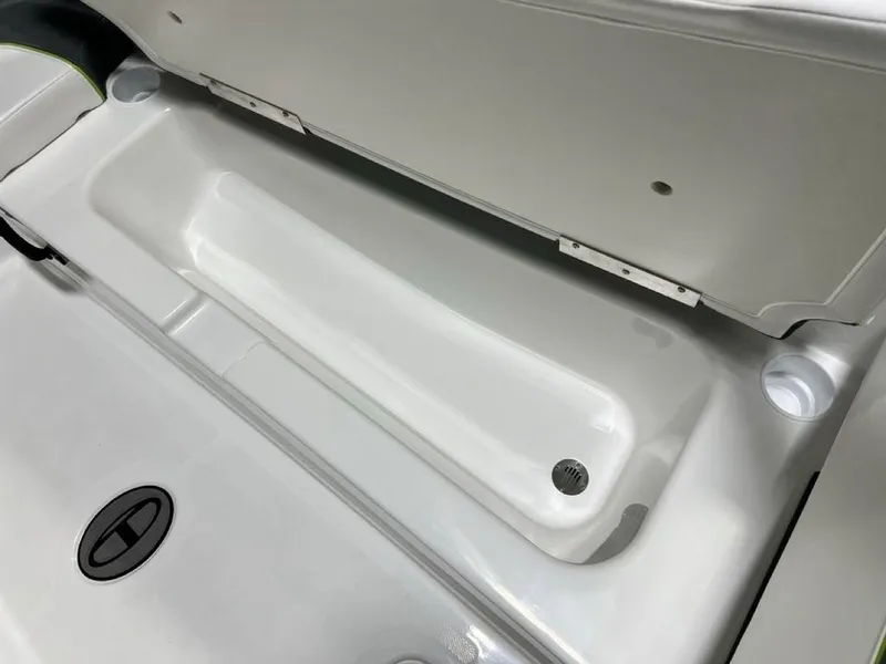 Slide: The Image of 2024 Tahoe T18 boat storage compartment with open lid. - 7