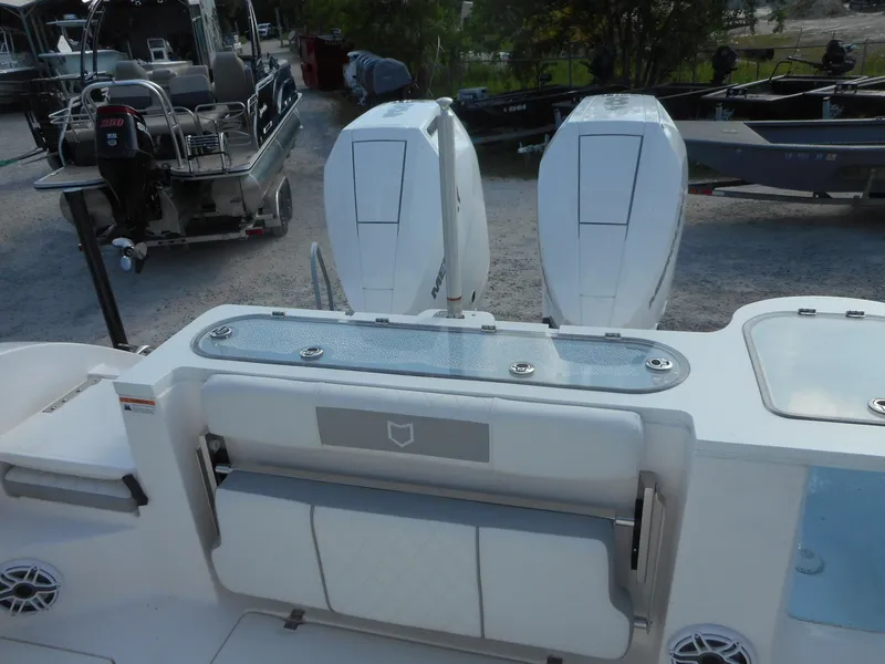 Slide: The Image of 2024 Sea Fox 328 Commander boat with dual outboard engines. - 12