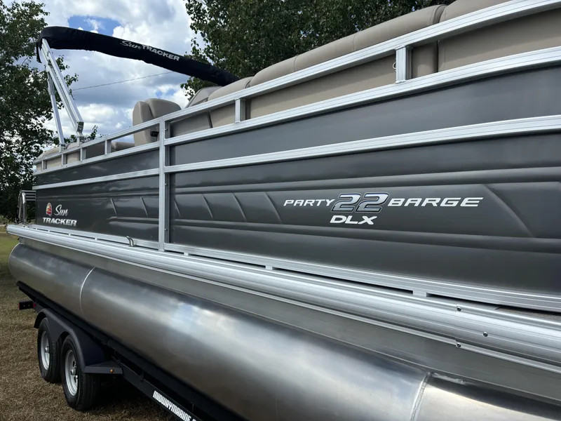 Slide: The Image of 2024 Sun Tracker Party Barge 22 RF DLX pontoon boat, side view. - 11