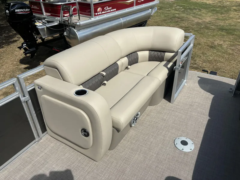 Slide: The Image of 2024 Sun Tracker Party Barge 22 RF DLX with beige seating and Mercury outboard motor. - 17