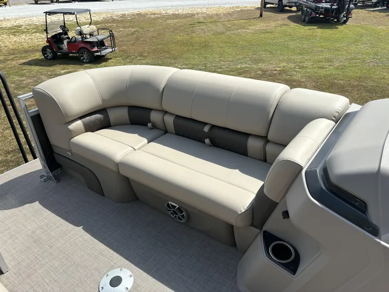 Slide: The Image of 2024 Sun Tracker Party Barge 22 RF DLX with beige seating and spacious deck. - 18