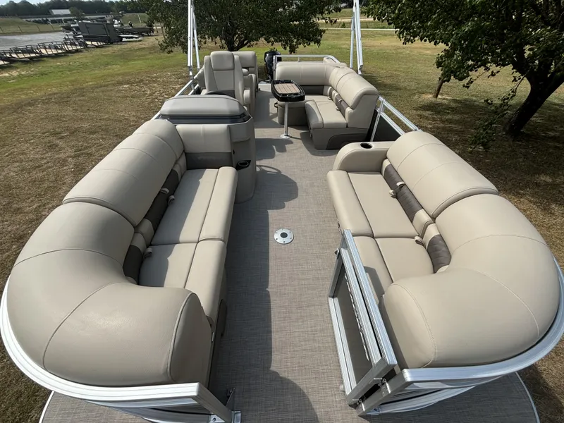 Slide: The Image of 2024 Sun Tracker Party Barge 22 RF DLX with spacious seating and modern design. - 5