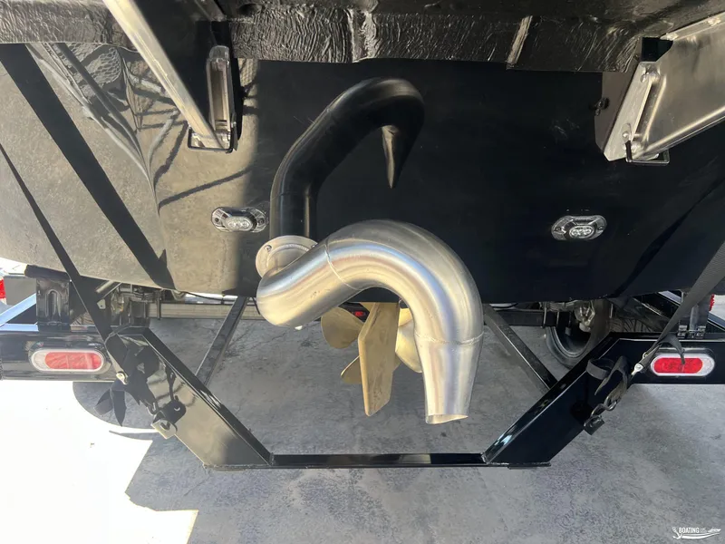 Slide: The Image of 2024 Heyday WT Surf boat propeller and exhaust system close-up. - 7