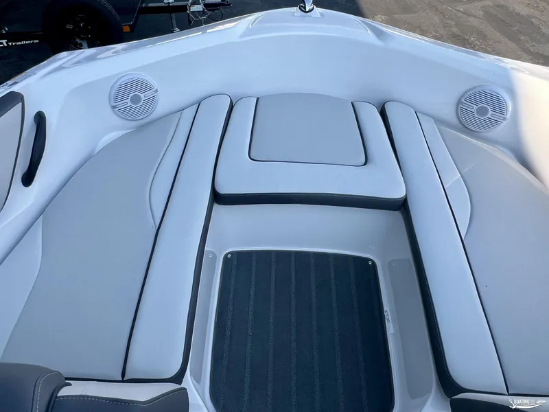 Slide: The Image of 2025 Yamaha AR190 boat interior with cushioned seating and speakers. - 2