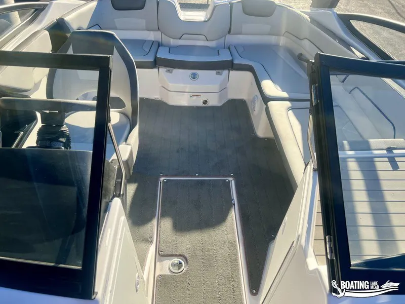Slide: The Image of 2025 Yamaha Boats AR190 interior with spacious seating and modern design. - 9