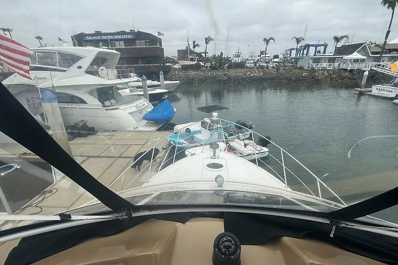 Slide: The Image of View from 2004 Carver 366 Motor Yacht docked at marina, surrounded by other boats. - 16