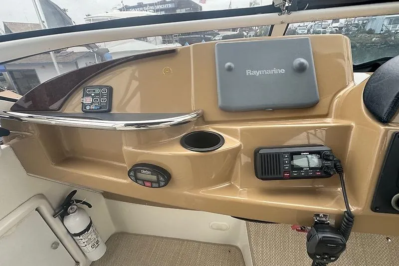 Slide: The Image of Control panel of a 2004 Carver 366 Motor Yacht with Raymarine equipment. - 21