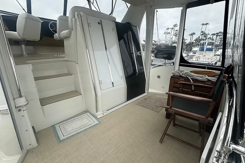Slide: The Image of Interior view of 2004 Carver 366 Motor Yacht with seating and steps. - 28