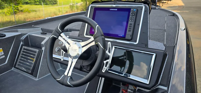 Slide: The Image of 2024 Ranger Z521R boat dashboard with advanced navigation and control systems. - 5