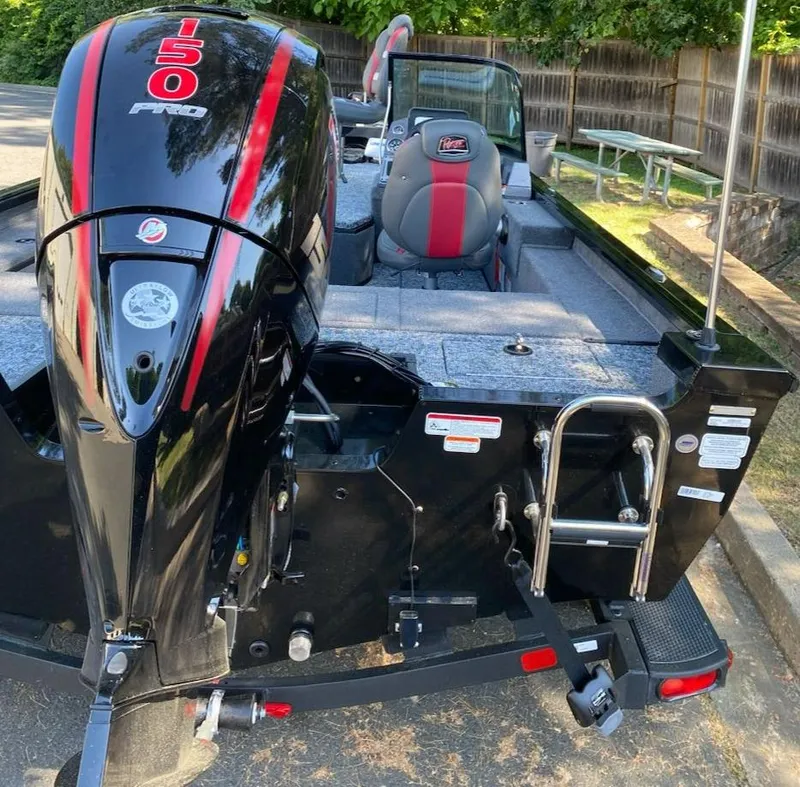 Slide: The Image of 2024 Ranger VS1782SC Reata boat with 150 HP engine, rear view. - 20