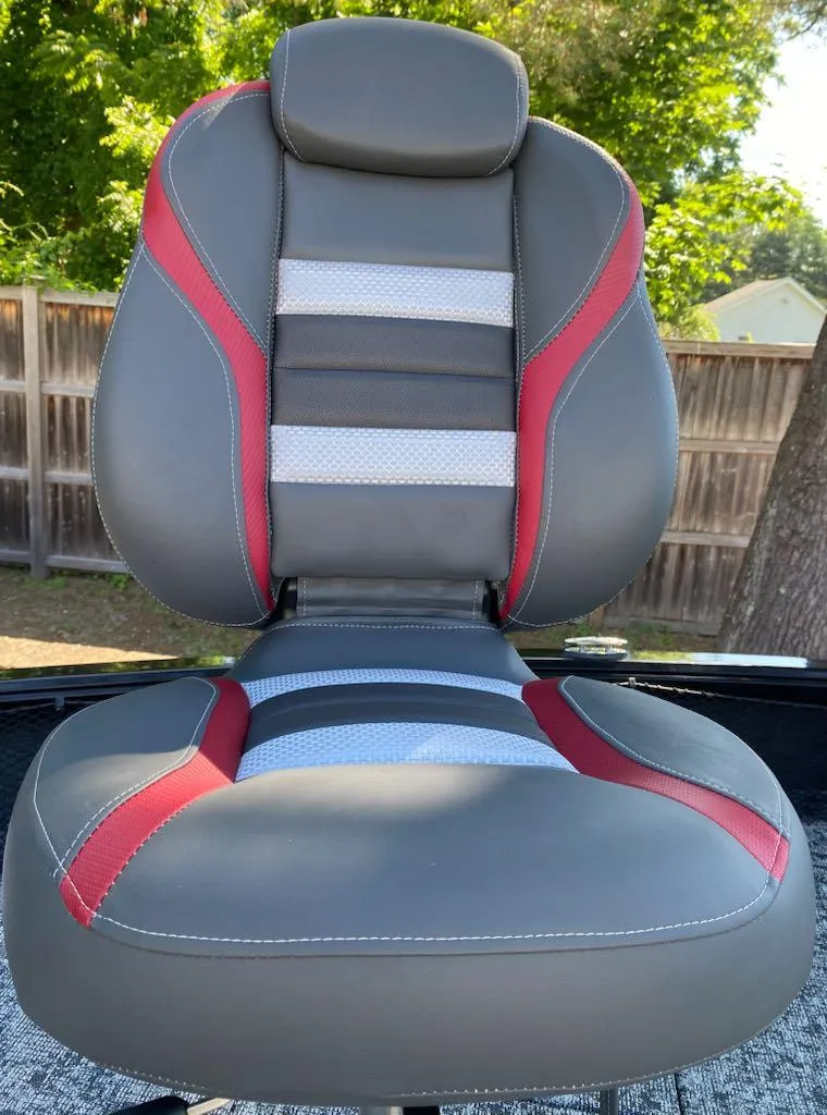 Slide: The Image of 2024 Ranger VS1782SC Reata boat seat with red and gray accents. - 23