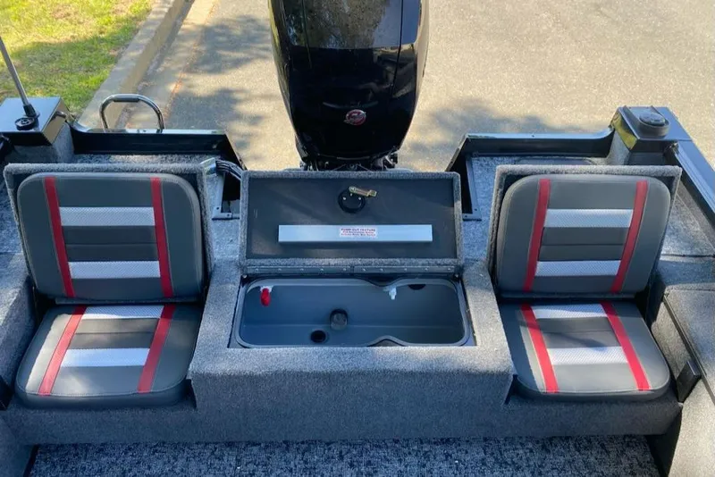 Slide: The Image of 2024 Ranger VS1782SC Reata boat interior with seating and storage compartments. - 6