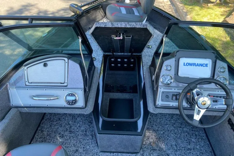 Slide: The Image of 2024 Ranger VS1782SC Reata boat cockpit with steering wheel and control panel. - 8
