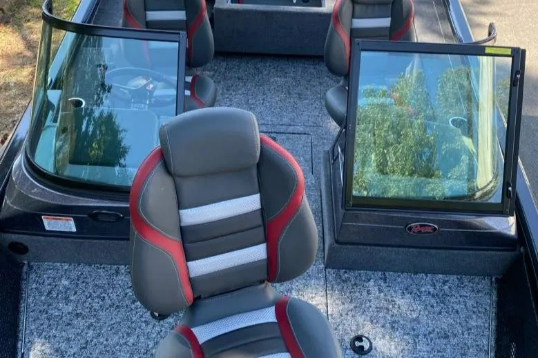 Slide: The Image of 2024 Ranger VS1782SC Reata boat interior with gray and red seats. - 9