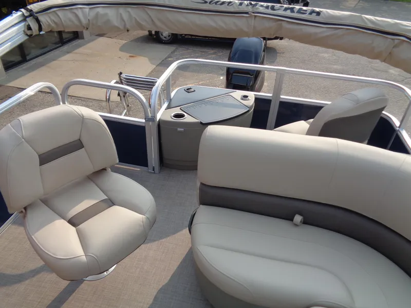 Slide: The Image of 2024 Sun Tracker Bass Buggy 18 DLX interior with comfortable seating and modern design. - 6