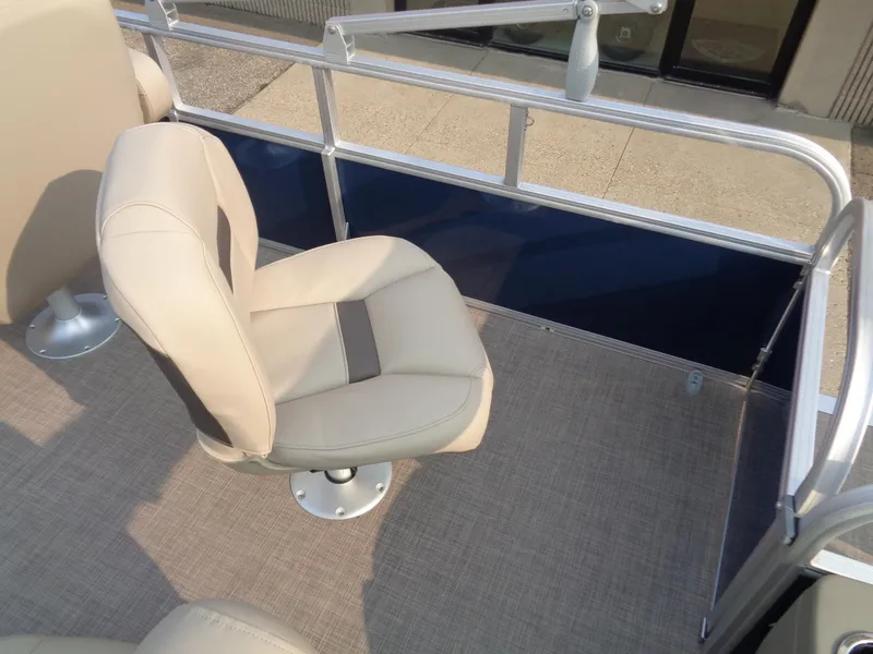 Slide: The Image of 2024 Sun Tracker Bass Buggy 18 DLX boat seat and deck view. - 8