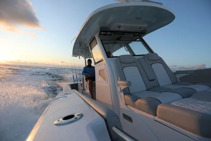 Slide: The Image of 2025 Sea Fox 368 Commander Center Console cruising at sunset. - 21