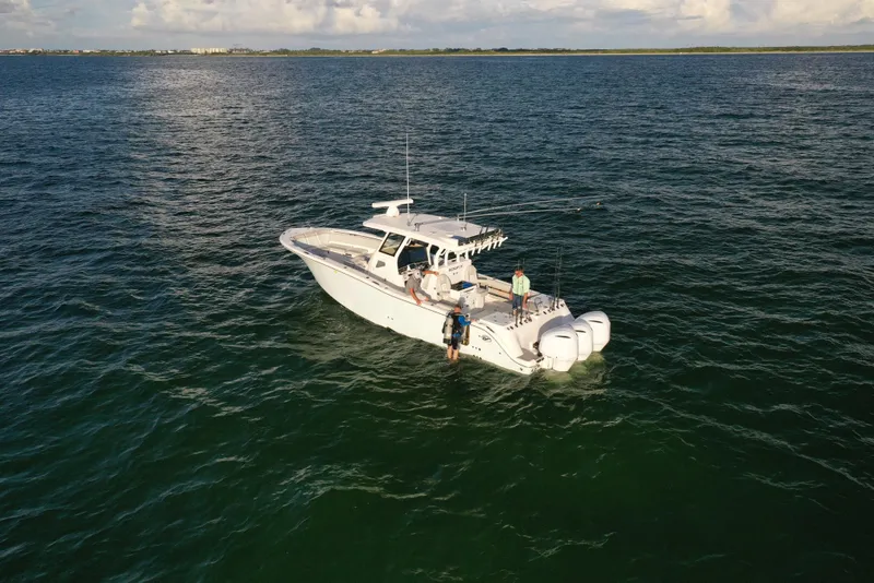 Slide: The Image of 2025 Sea Fox 368 Commander Center Console boat on open water. - 14