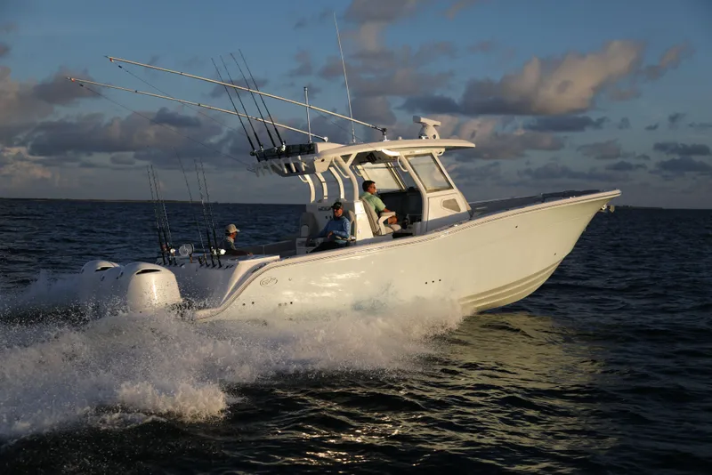 Slide: The Image of 2025 Sea Fox 368 Commander Center Console boat cruising on the ocean. - 6