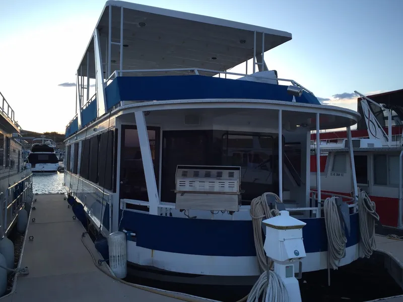 Slide: The Image of 2001 Skipperliner Houseboat docked at marina. - 1