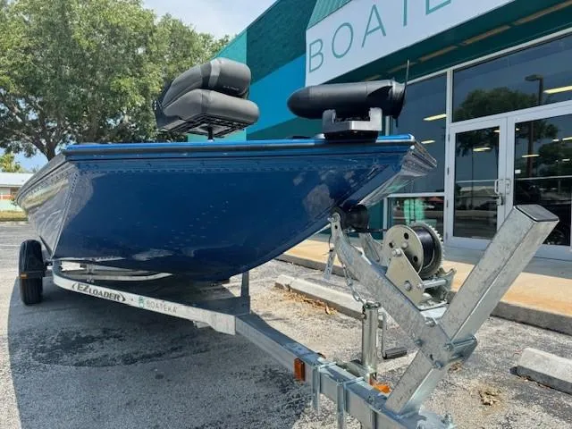 Slide: The Image of 2021 Lund 1875 Renegade boat on trailer outside dealership. - 3
