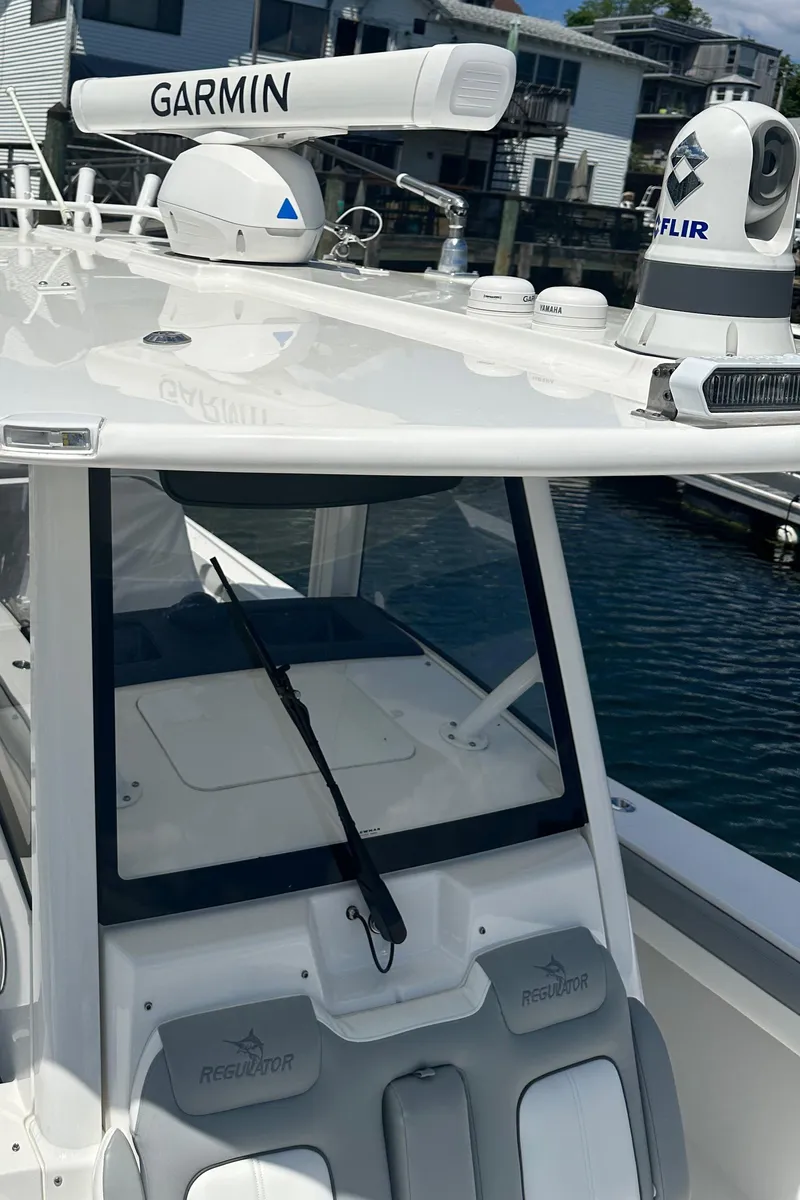Slide: The Image of 2022 Regulator 34 boat with Garmin and FLIR equipment on the roof. - 8
