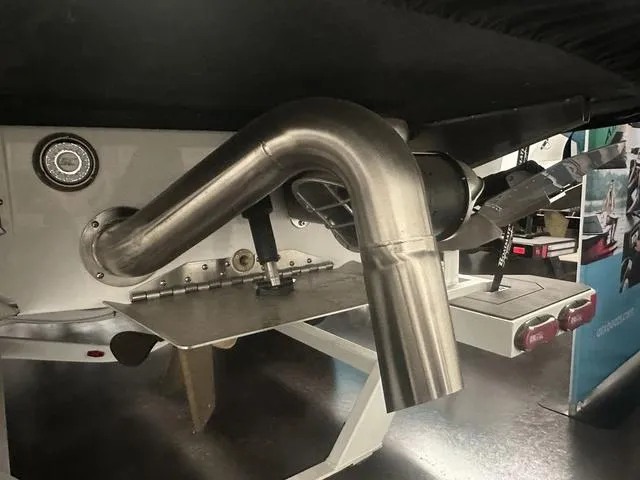 Slide: The Image of Close-up of the exhaust system on a 2023 ATX Surf Boats 24 Type-S. - 3