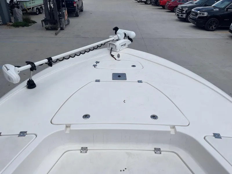 Slide: The Image of 2019 Tidewater 2410 Bay Max boat with trolling motor on deck. - 12
