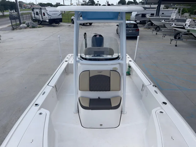 Slide: The Image of 2019 Tidewater 2410 Bay Max boat, center console, docked at marina. - 13