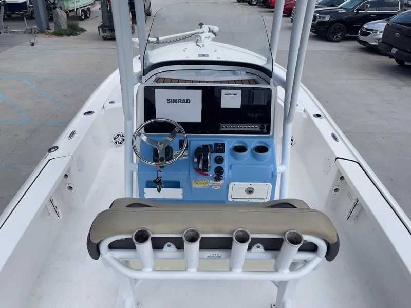 Slide: The Image of 2019 Tidewater 2410 Bay Max boat console with Simrad electronics and rod holders. - 17