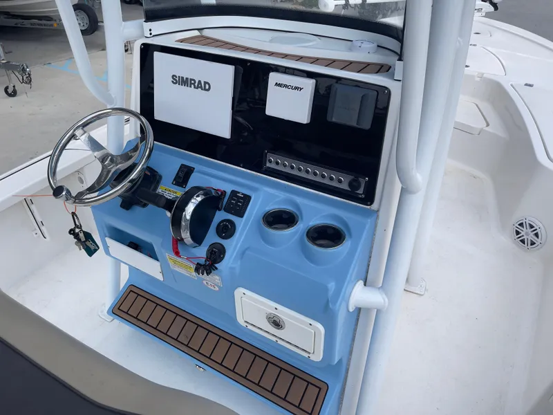 Slide: The Image of 2019 Tidewater 2410 Bay Max boat console with Simrad and Mercury electronics. - 18