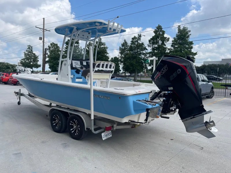 Slide: The Image of 2019 Tidewater 2410 Bay Max boat on trailer with outboard motor. - 3