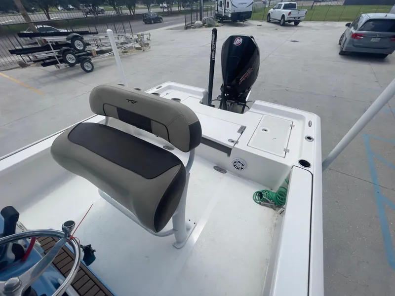 Slide: The Image of 2019 Tidewater 2410 Bay Max boat with seating and outboard motor. - 33