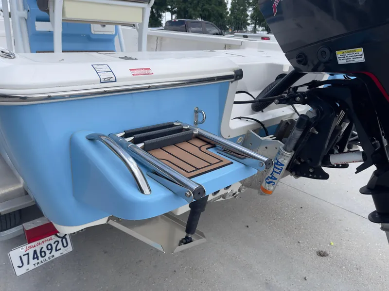Slide: The Image of 2019 Tidewater 2410 Bay Max boat with motor and swim platform. - 36