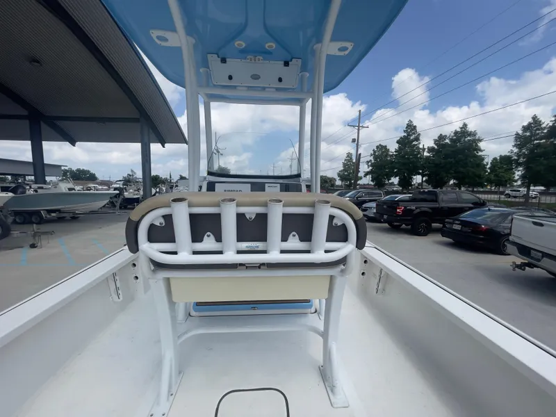 Slide: The Image of 2019 Tidewater 2410 Bay Max boat interior with rod holders and seating. - 40